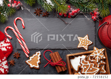 Christmas card with gingerbread cookies and tea Christmas card with gingerbread cookies and tea 72558152