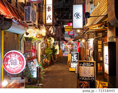 夜の大阪梅田 お初天神通り商店街の路地裏の写真素材