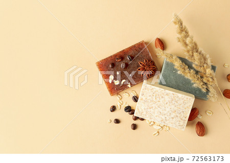 Pieces of natural handmade soap on beige background Pieces of natural handmade soap on beige background 72563173