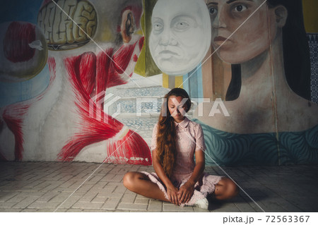 Meditation on a street 72563367