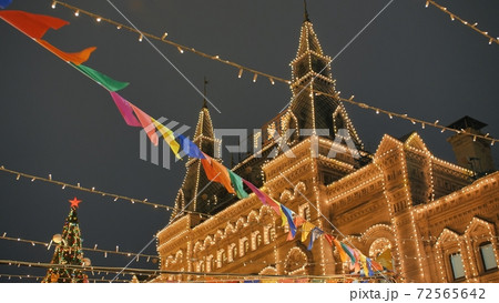 Christmas flags on Red Square in Moscow. Christmas flags on Red Square in Moscow. 72565642