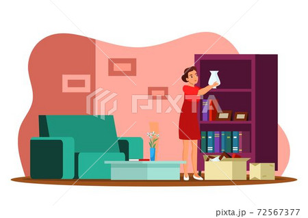 Woman unpacking cardboard box and home moving Woman unpacking cardboard box and home moving 72567377