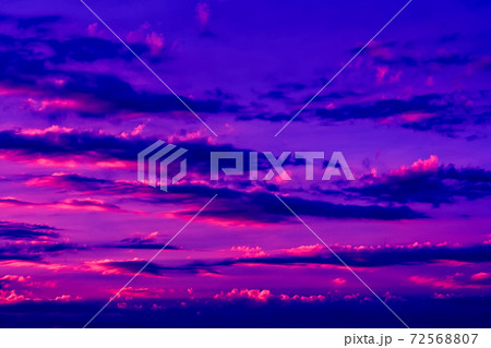 Pink sky with beautiful clouds. Charming sunset landscape 72568807
