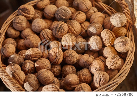 Walnuts in a pile Walnuts in a pile 72569780