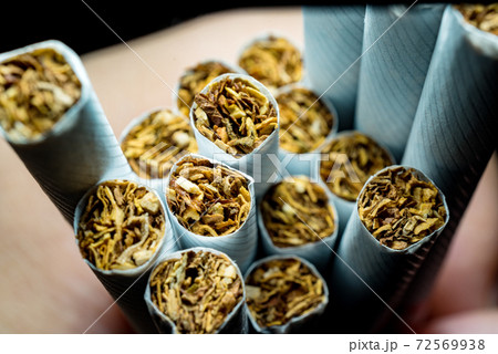 A pack of white cigarettes photographed close-up A pack of white cigarettes photographed close-up 72569938