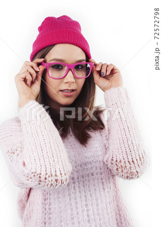 young pretty stylish hipster girl posing emotional isolated on white background happy smiling cool smile, lifestyle people concept 72572798