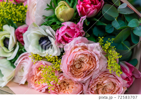 Close-up Large Beautiful bouquet of mixed flowers. Flower background and Wallpaper. Floral shop concept . Beautiful fresh cut bouquet. Flowers delivery 72583707
