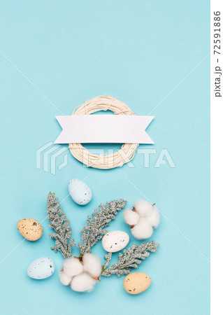 Craft Easter eggs on blue pastel background, space for text. Flat lay image composition, top view. 72591886