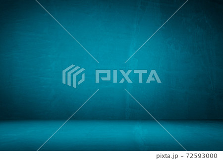 Vintage grunge blue concrete texture studio wall background with vignette. Vintage grunge blue concrete texture studio wall background with vignette. 72593000