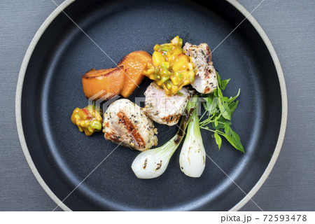 barbecue crocodile tail eye fillet with roasted sweet potatoes and mango chili chutney o 72593478