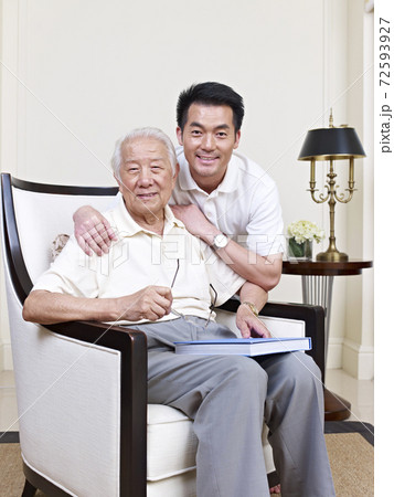 portrait of an asian senior and his adult son 72593927