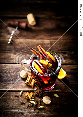 Mulled wine, hot warming drink with spices 72595498