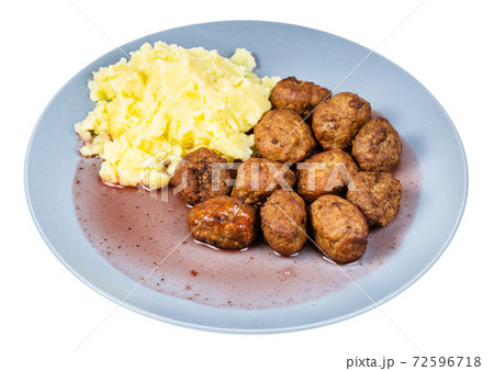meatballs with and mashed potatoes on blue plate 72596718