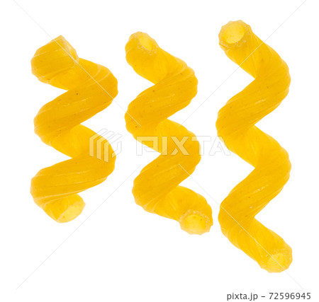 three single dried Cavatappi close up isolated three single dried Cavatappi close up isolated 72596945
