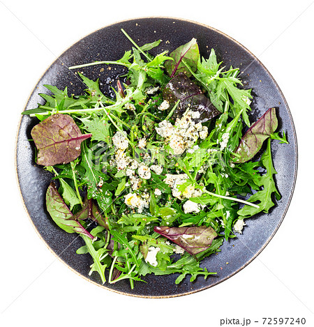 top view of vegetarian salad with cheese on plate 72597240