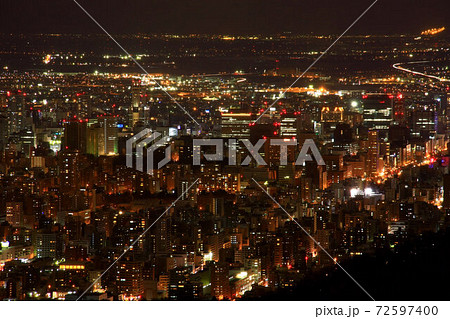 奥三角山から見る札幌の冬夜景の写真素材