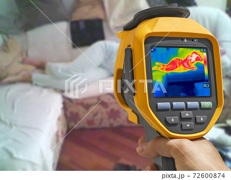 Recording with thermal camera Young woman is lying on the bed 72600874
