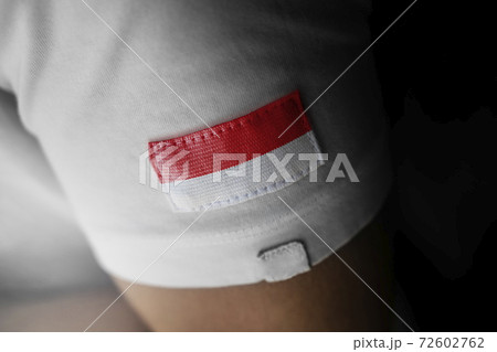 Patch of the national flag of the Indonesia on a white t-shirt Patch of the national flag of the Indonesia on a white t-shirt 72602762