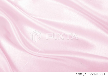 Smooth elegant pink silk or satin texture as wedding background. Luxurious background design 72603521