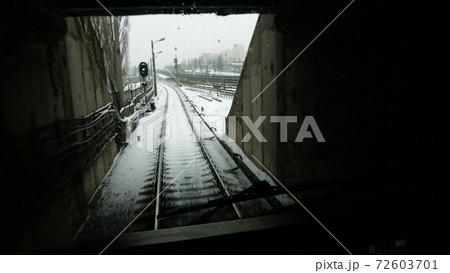 Passenger train going through tunnel. 72603701