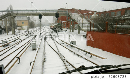 Snow covered railway lines in winter. 72603723