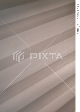 Background wall with texture and shadow from blinds. 72603741