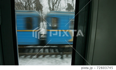 Close up train in motion outdoors. Close up train in motion outdoors. 72603745