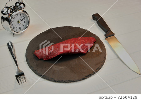 Raw beef meat on a dinner. Raw beef meat on a dinner. 72604129