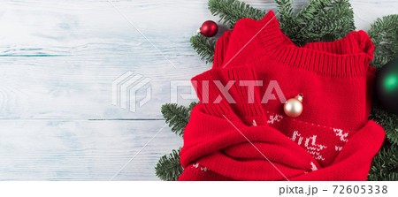 Red ugly christmas sweater with green ornament Red ugly christmas sweater with green ornament 72605338