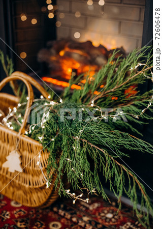 interior house black golden fireplace christmas tree 72606478