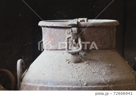 vintage old metal cans on a dark background 72606941