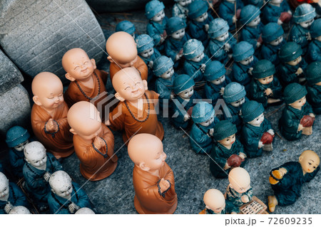 Cute buddha statue dolls at Huhuam temple in Yangyang, Korea 72609235
