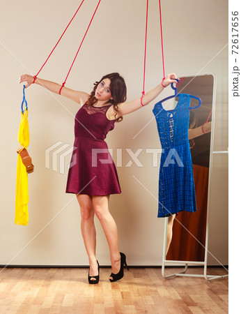Addicted to shopping woman girl marionette with clothes 72617656