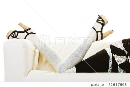 female legs in woolen stockings heeled shoes female legs in woolen stockings heeled shoes 72617668