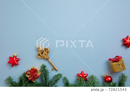 Christmas holiday decorations on blue background top view. Copy space for text 72621543