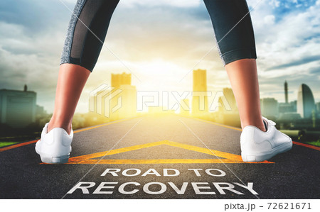 Woman leg standing on Road to recovery concept for business and health concept with golden city background. 72621671
