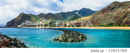 Impressive beach of volcanic Tenerife island- Las Teresitas with scenic San Andres village. Impressive beach of volcanic Tenerife island- Las Teresitas with scenic San Andres village. 72625768