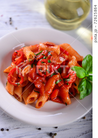 Penne pasta with chili sauce arrabiata Penne pasta with chili sauce arrabiata 72625864