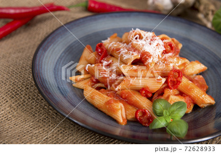 Penne pasta with chili sauce arrabiata Penne pasta with chili sauce arrabiata 72628933