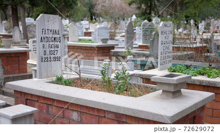 Graves with headstones at Muslim cemetery. 72629072