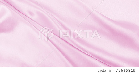 Smooth elegant pink silk or satin texture as wedding background. Luxurious background design Smooth elegant pink silk or satin texture as wedding background. Luxurious background design 72635819