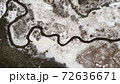 Aerial landscape of natural river in winter 72636671