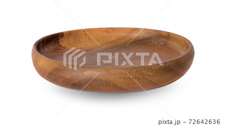 Empty round wooden plate isolated on white background Empty round wooden plate isolated on white background 72642636