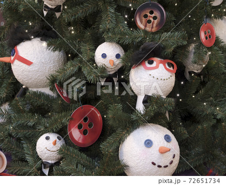 Spruce tree with christmas balls on branches. Spruce tree with christmas balls on branches. 72651734