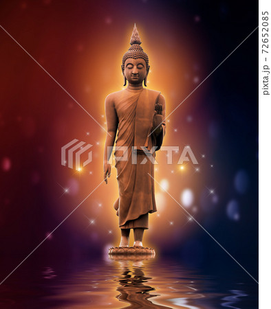 Buddha statue on water gold background purple color blue 72652085