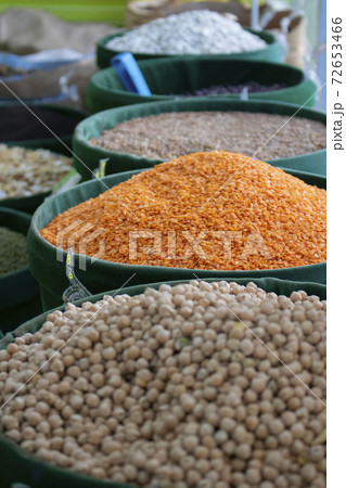 Uncooked assorted legumes. Healthy cereals in eco bags Uncooked assorted legumes. Healthy cereals in eco bags 72653466