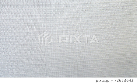 Natural linen texture as beige background. Beige rough textured fabric yarn. Close-up beige old ecru flax fibre seamless pattern 72653642