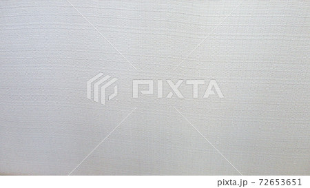 Natural linen texture as beige background. Beige rough textured fabric yarn. Close-up beige old ecru flax fibre seamless pattern 72653651