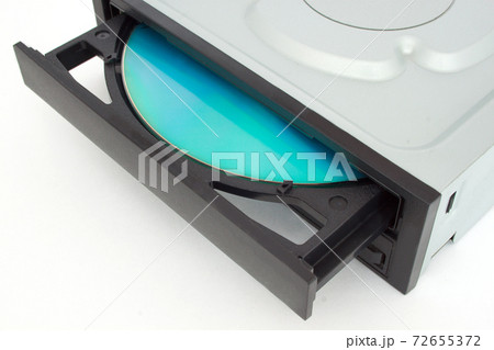 CD - DVD drive with a black cap and disk inside. CD - DVD drive with a black cap and disk inside. 72655372