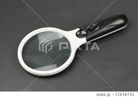 Magnifying glass isolated on black Magnifying glass isolated on black 72656732
